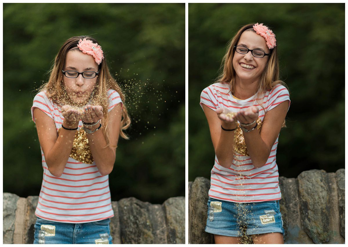 Jackie_Kelley_Photography_Family_Photographer_Montgomery_County_Philadelphia_Pa_Girl_poses_by_water_Fairmount_park_Valley_Green_photos_of_blowing_glitter