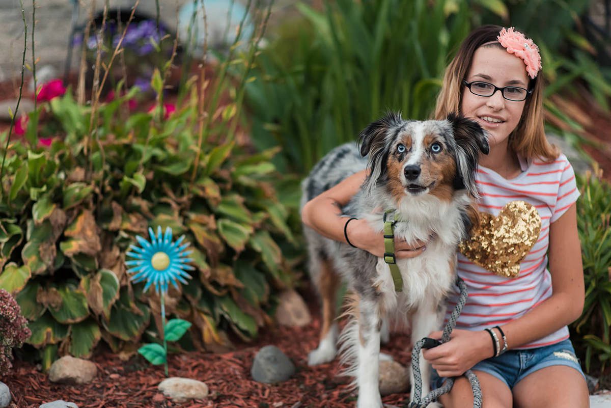 Jackie_Kelley_Photography_Family_Photographer_Montgomery_County_Philadelphia_Pa_Girl_poses_by_water_Fairmount_park_Valley_Green_Photos_of_a_girl_and_her_dog