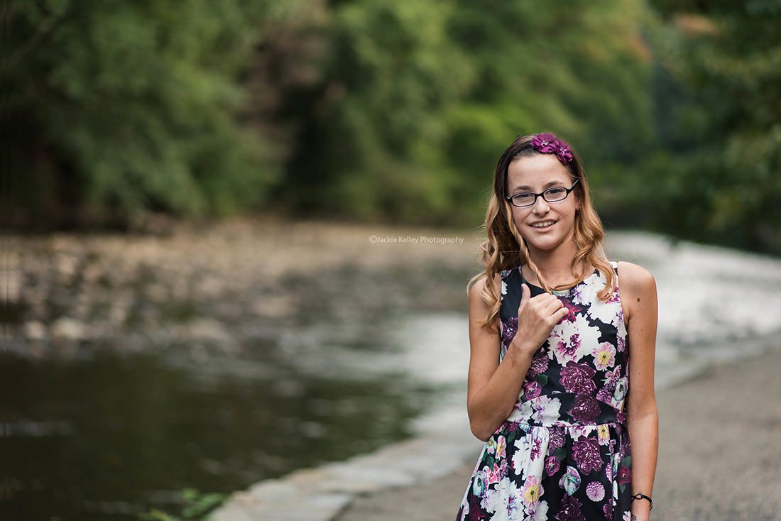 Jackie Kelley Photography Family Photographer Montgomery County Philadelphia Pa Girl poses by water Fairmount park Valley Green what to wear to your family photos